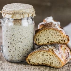 Image of sourdough starter and sourdough bread